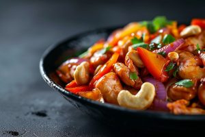 Gai Pad Med Mamuang : Poulet sauté avec noix de cajou et oignons