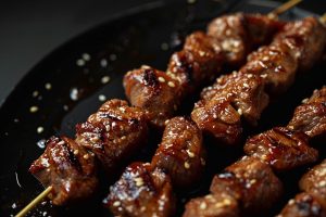 Moo Ping : Brochettes de porc marinées et grillées